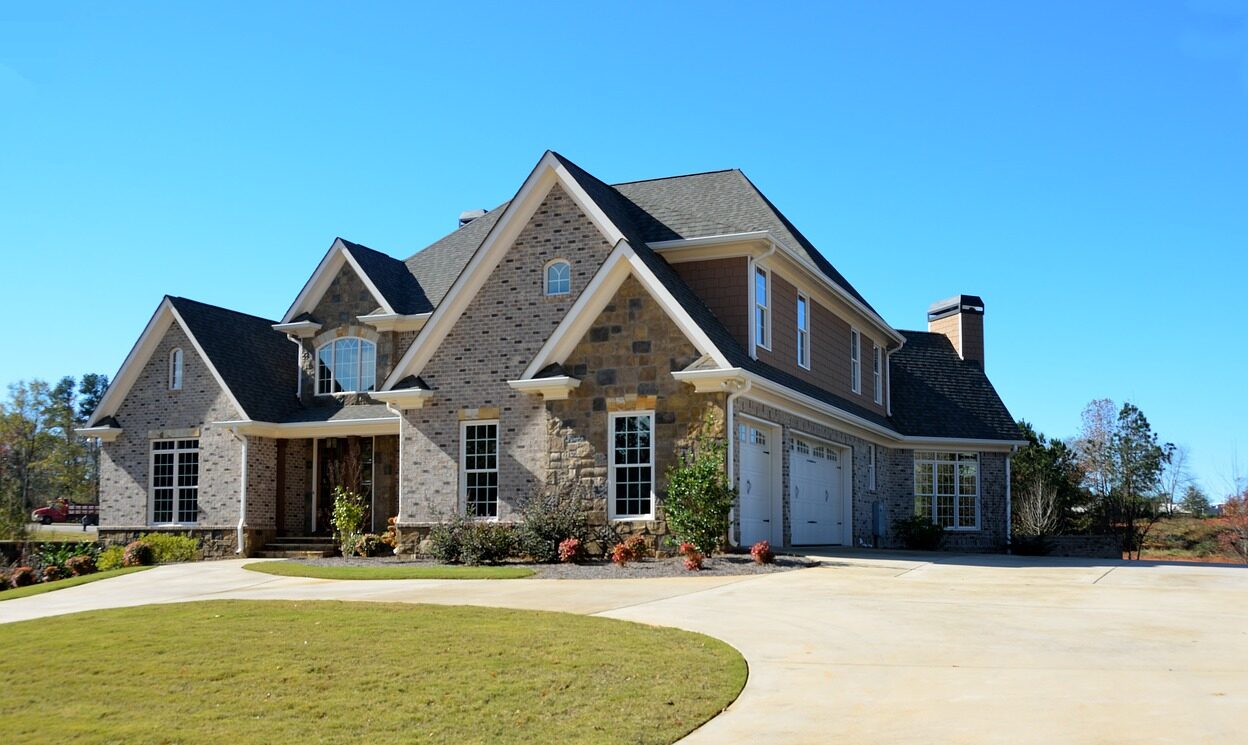 Photo of a high-end smaller mansion with a great lawn that can be bought with under 5% down and turned into a $10k per weekend rental